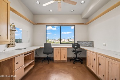 Welcome to 30 W. Stone Loop, a bright and lofty ridge-top home