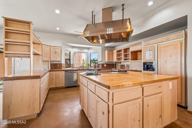 Welcome to 30 W. Stone Loop, a bright and lofty ridge-top home