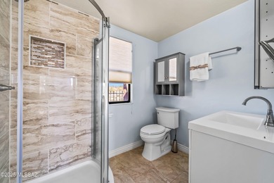 Welcome to 30 W. Stone Loop, a bright and lofty ridge-top home