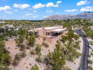 Welcome to 30 W. Stone Loop, a bright and lofty ridge-top home