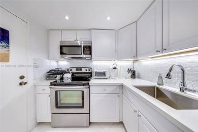 Beautifully updated large studio in South Bay Club featuring a