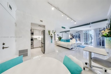 Beautifully updated large studio in South Bay Club featuring a