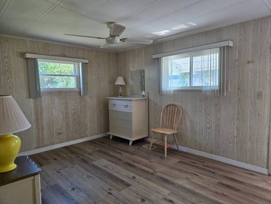 THIS LOVELY 2/2 IS MOVE IN READY. NEWER FLOORING, NEWER A/C - photo 22