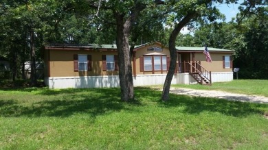 Lake Home For Sale in Pelican Bay, Texas