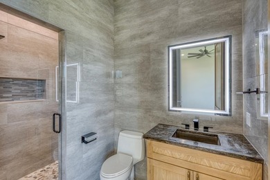 Experience luxury in this stunning new home situated on nearly - photo 35