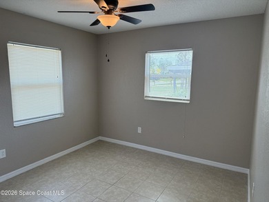 Step inside to find tile flooring flowing throughout the main - photo 10