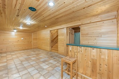 Set on 1.19 wooded acres in the heart of Sugar Camp, this 1,746 - photo 11
