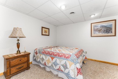 Set on 1.19 wooded acres in the heart of Sugar Camp, this 1,746 - photo 12