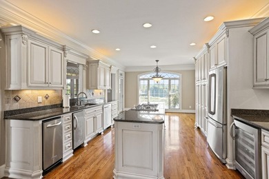 Luxury Brick Home on Golf Course with Pond View-3BR|4.5BA| 4-Car - photo 12