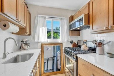 Beautifully updated and move-in ready, this charming co-op - photo 14