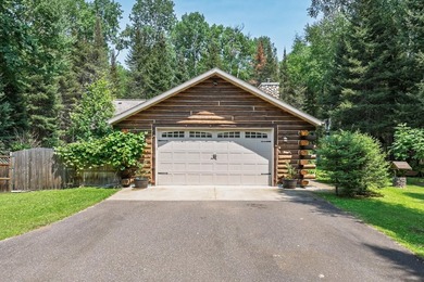 Set on 1.19 wooded acres in the heart of Sugar Camp, this 1,746 - photo 17