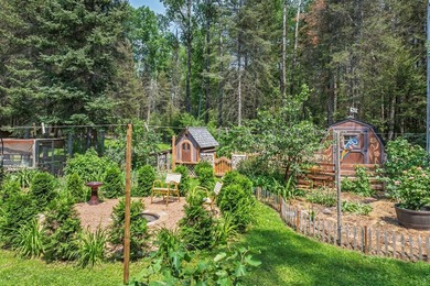 Set on 1.19 wooded acres in the heart of Sugar Camp, this 1,746 - photo 21