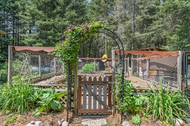 Set on 1.19 wooded acres in the heart of Sugar Camp, this 1,746 - photo 22