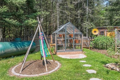 Set on 1.19 wooded acres in the heart of Sugar Camp, this 1,746 - photo 25