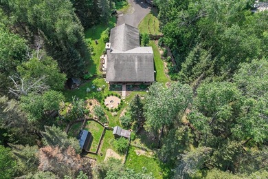 Set on 1.19 wooded acres in the heart of Sugar Camp, this 1,746 - photo 26