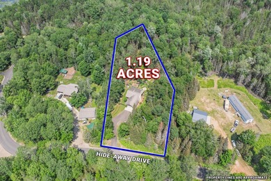 Set on 1.19 wooded acres in the heart of Sugar Camp, this 1,746 - photo 27