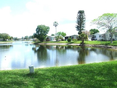 SPECTACULAR VIEW OF THE LAKE-LARGE 3 BEDROOM/ 2 BATH- LAMINATE - photo 2