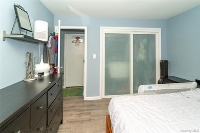 Tucked within the quiet, tree-lined Estates at Bayside, this - photo 14