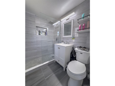 Tucked within the quiet, tree-lined Estates at Bayside, this - photo 15
