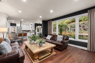 Set on a private half-acre at the end of a quiet street, this