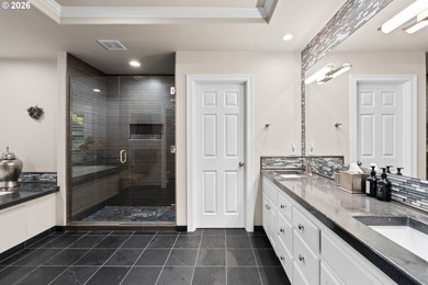 Set on a private half-acre at the end of a quiet street, this