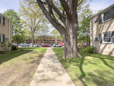 Tucked within the quiet, tree-lined Estates at Bayside, this - photo 24