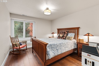 Set on a private half-acre at the end of a quiet street, this