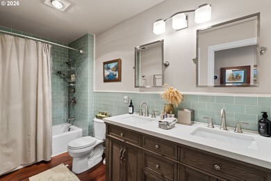 Set on a private half-acre at the end of a quiet street, this