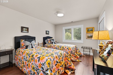 Set on a private half-acre at the end of a quiet street, this