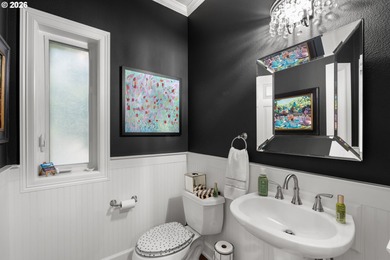 Set on a private half-acre at the end of a quiet street, this