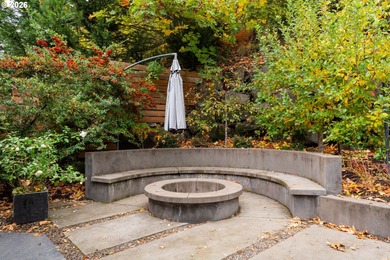 Set on a private half-acre at the end of a quiet street, this