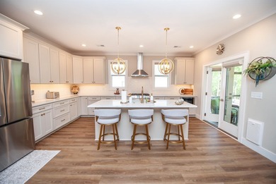 Welcome to 431 Brunswick Lane, an exceptional residence located - photo 12