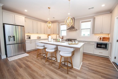 Welcome to 431 Brunswick Lane, an exceptional residence located - photo 13
