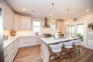 Welcome to 431 Brunswick Lane, an exceptional residence located - photo 17