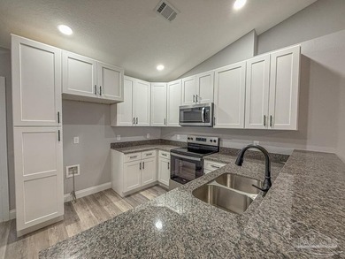Brand NEW with Custom Tile shower, Covered back porch and 2 car - photo 5