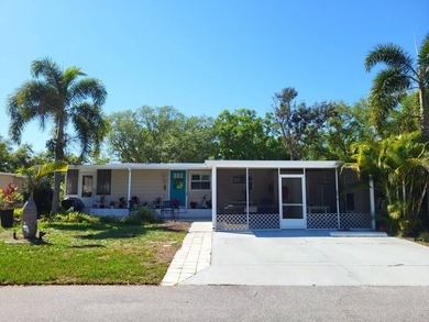 COASTAL ELEGANCE IN A PRIME LOCATION IN THE PARK! A beautiful - photo 1