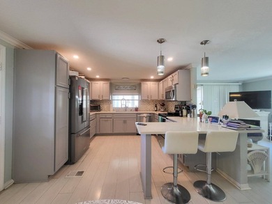 COASTAL ELEGANCE IN A PRIME LOCATION IN THE PARK! A beautiful - photo 5