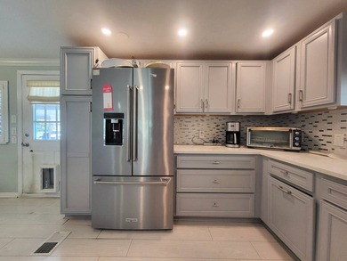 COASTAL ELEGANCE IN A PRIME LOCATION IN THE PARK! A beautiful - photo 9