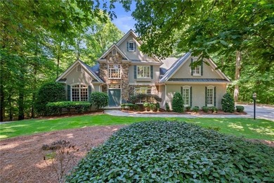 Welcome to this exceptional custom-built home in the prestigious - photo 1