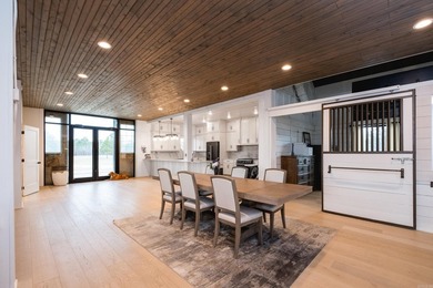 Private barndominium retreat on approximately 71 acres behind a - photo 13