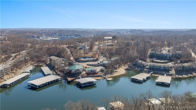 Affordable lakefront living at the 2 MM! This 2 bedroom, 1