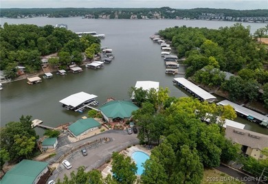 Affordable lakefront living at the 2 MM! This 2 bedroom, 1