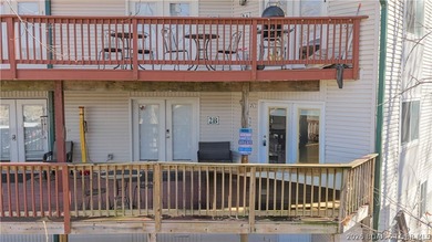 Affordable lakefront living at the 2 MM! This 2 bedroom, 1