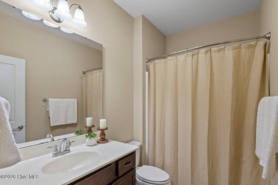 A pristine three-bedroom townhouse in the Cypress Creek - photo 10