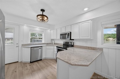 Beautifully updated lakefront home with a private dock, workshop - photo 13