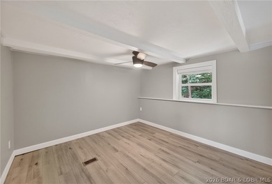 Beautifully updated lakefront home with a private dock, workshop - photo 22