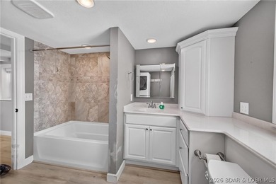 Beautifully updated lakefront home with a private dock, workshop - photo 24