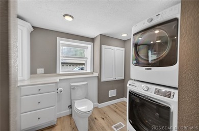 Beautifully updated lakefront home with a private dock, workshop - photo 25