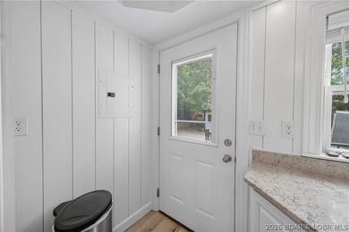 Beautifully updated lakefront home with a private dock, workshop - photo 28