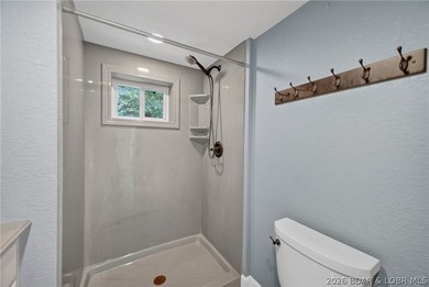 Beautifully updated lakefront home with a private dock, workshop - photo 38